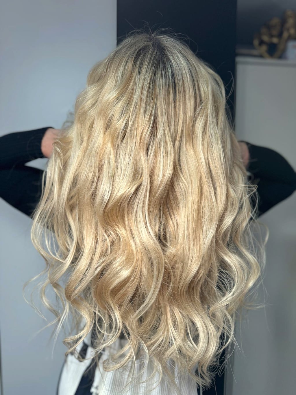 Before and after hair extensions transformation showing keratin bonds at Sisters Hair Extensions London.