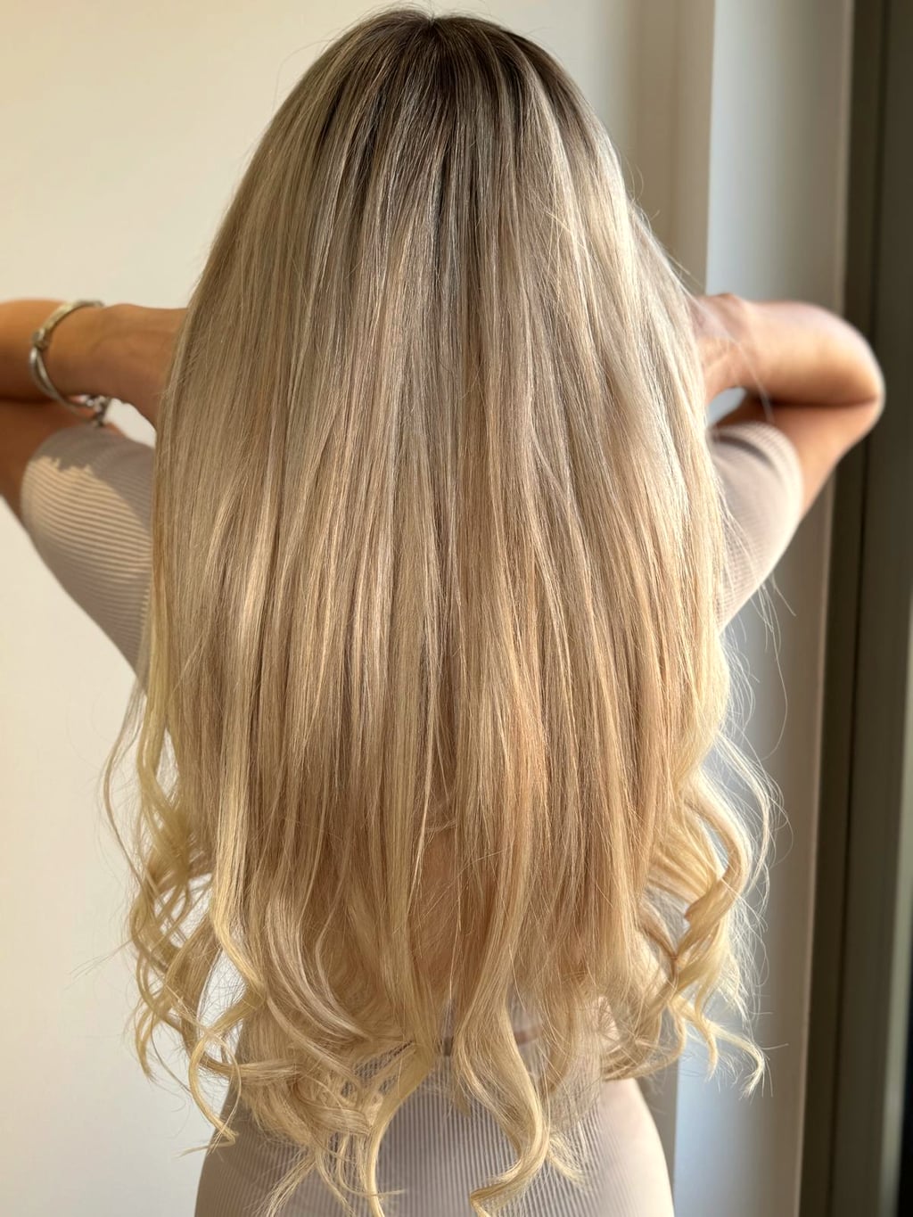 Before and after hair extensions transformation showing keratin bonds at Sisters Hair Extensions London.