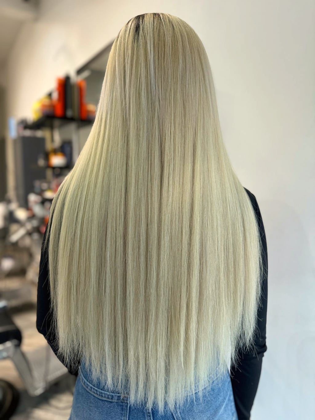 Before and after hair extensions transformation showing keratin bonds at Sisters Hair Extensions London.
