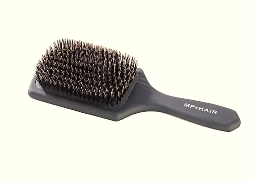 Professional extension brush recommended for keratin bond and tape-in aftercare